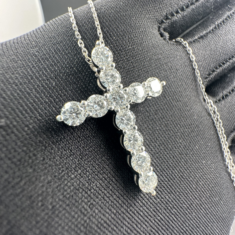 Gold Cross with a Row of Diamonds