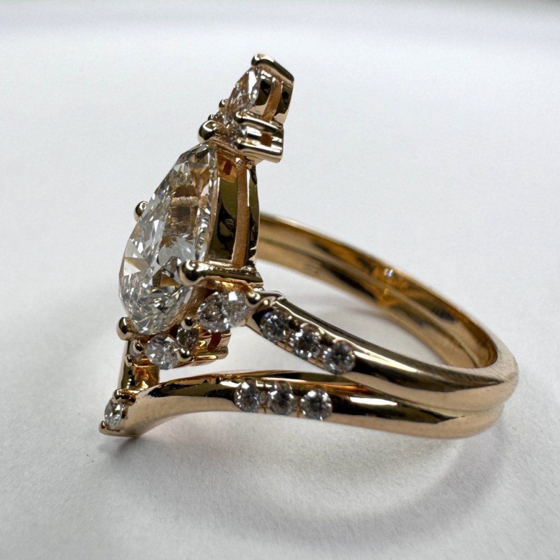 Ring with a Pear-Shaped Diamond and a Composition of Brilliants, Marquises and Round Stones – photo 2 of 3