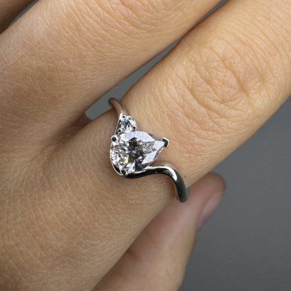 Asymmetric Ring with a Pear-Cut Diamond