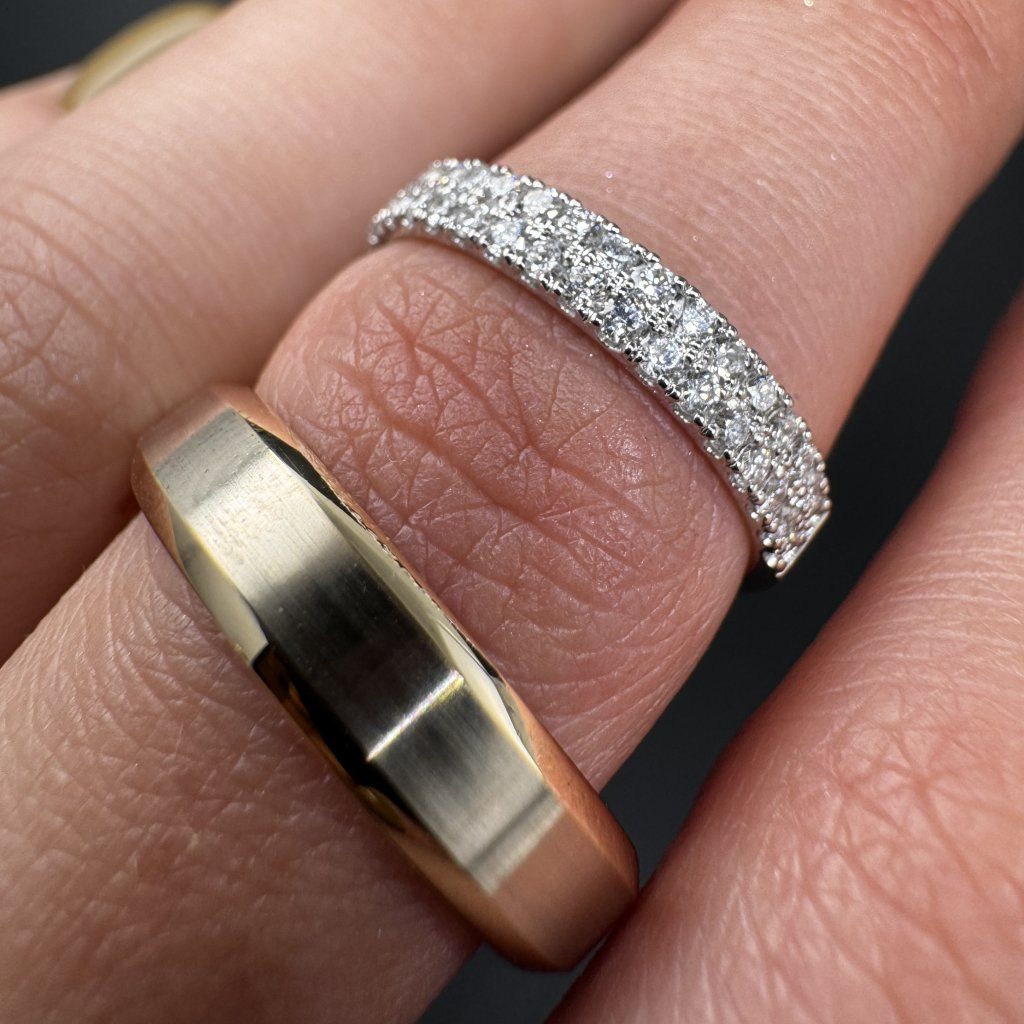 A Pair of Wedding Rings in White and Yellow Gold with Diamond Pavé – photo 1 of 5