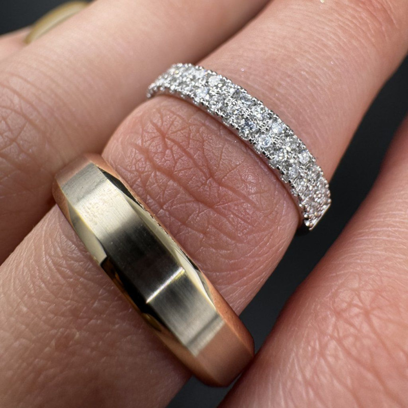 A Pair of Wedding Rings in White and Yellow Gold with Diamond Pavé – photo 1 of 5
