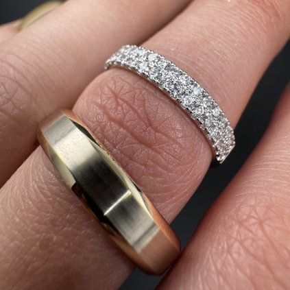 A Pair of Wedding Rings in White and Yellow Gold with Diamond Pavé